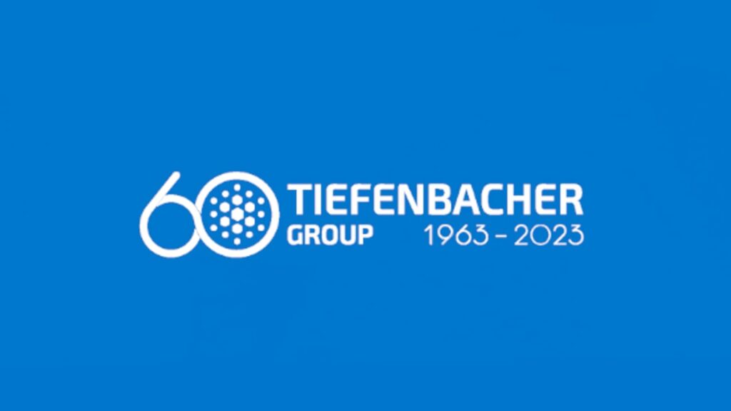 Tiefenbacher Group - White "60" with a dotted circle for the zero, next to "Tiefenbacher Group 1963–2023" on a blue background, marking 60 years of excellence in pharmaceutical healthcare solutions and API distribution.