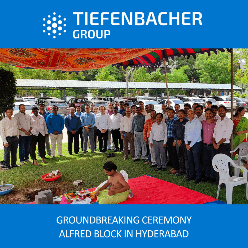Tiefenbacher Group - A large group gathers outdoors under a colorful canopy for a groundbreaking ceremony as a priest leads rituals. Highlighting Tiefenbacher Group’s family-owned pharmaceutical company and patient-centric drug development, event details frame the image.