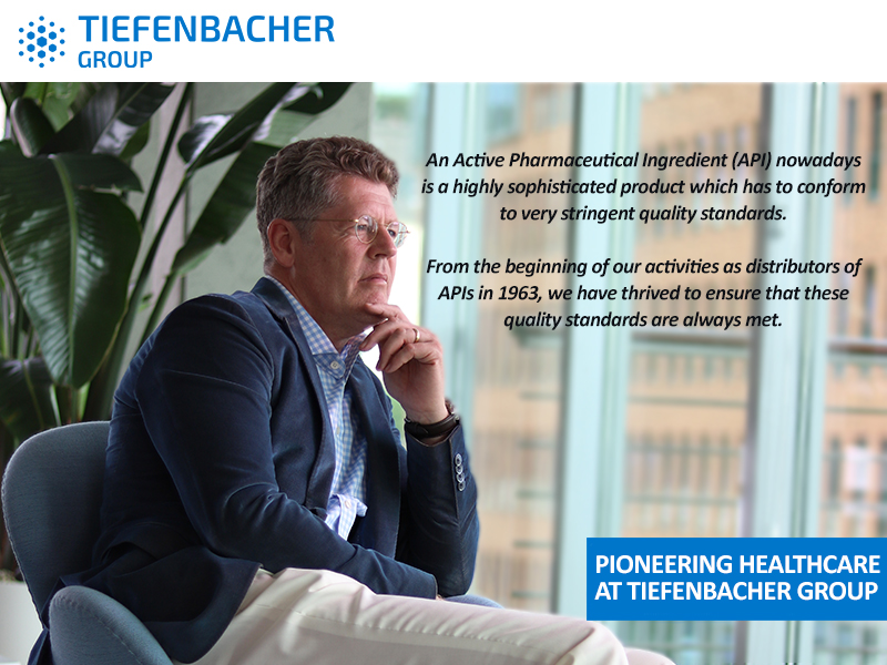 Tiefenbacher Group - A man in a suit sits thoughtfully in a modern office with large windows. Text highlights the importance of pharmaceutical quality standards and Tiefenbacher Group’s leadership in finished dosage forms and patient-centric drug development since 1963.